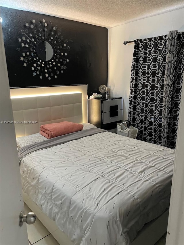 bedroom with a textured ceiling