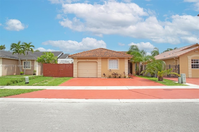 view of front of property with a garage