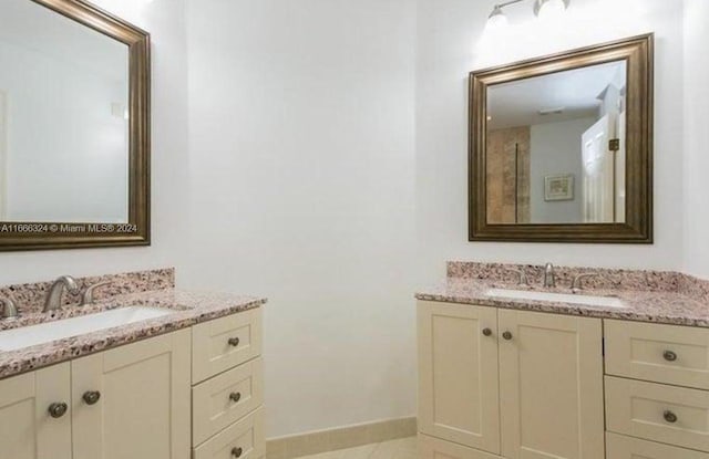 bathroom featuring vanity and tile patterned floors