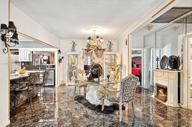 dining area featuring a lit fireplace, marble finish floor, wine cooler, and a notable chandelier