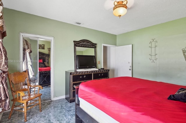 bedroom with visible vents