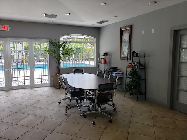 dining space with light tile patterned floors