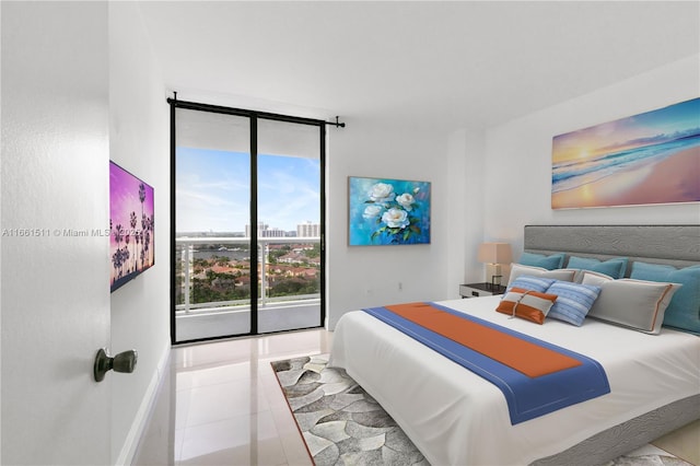 tiled bedroom featuring a wall of windows and access to outside