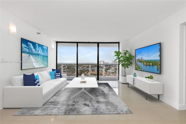 living room with expansive windows and light tile patterned flooring