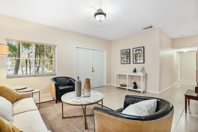 living room with light tile patterned floors