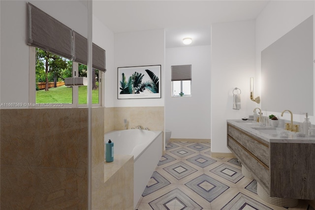 bathroom featuring vanity and a bathing tub