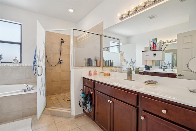 full bathroom with tile patterned flooring, a garden tub, visible vents, vanity, and a stall shower