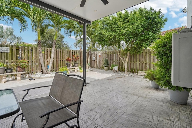 view of patio featuring ceiling fan and a fenced backyard