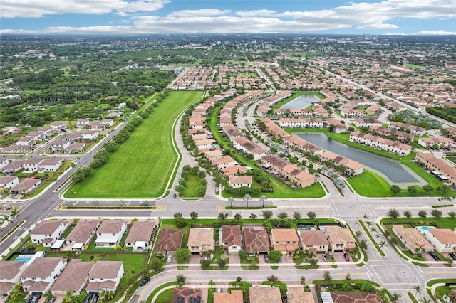 aerial view featuring a residential view and a water view