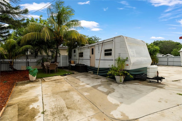 rear view of property with a patio