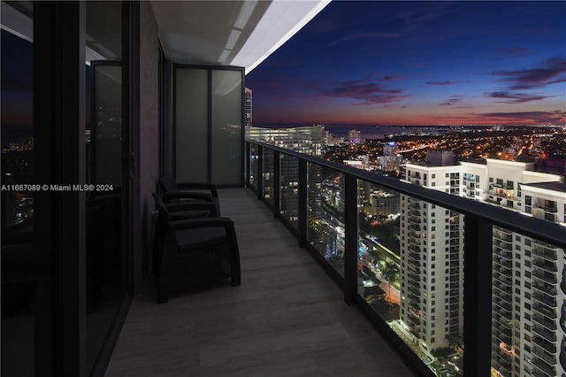 view of balcony at dusk