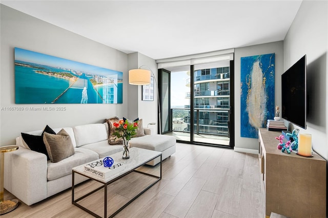 45 SW 9th St Unit 4007, Miami, FL 33130 - living area featuring floor to ceiling windows and wood finished floors
