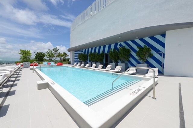 45 SW 9th St Unit 4007, Miami, FL 33130 - community pool featuring a patio area