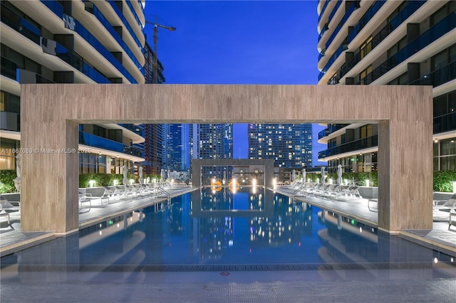 45 SW 9th St Unit 4007, Miami, FL 33130 - pool at twilight with a view of city lights and a community pool