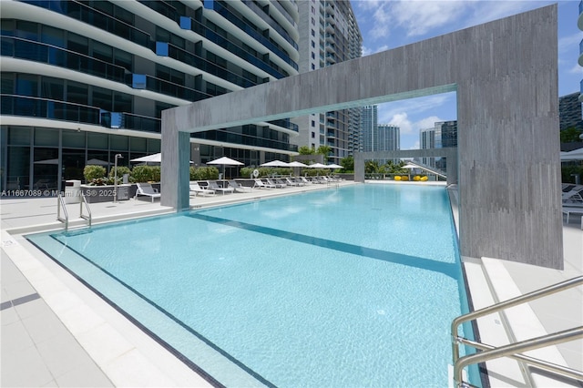 45 SW 9th St Unit 4007, Miami, FL 33130 - community pool with a patio and a city view