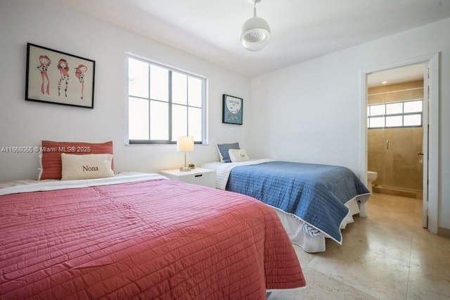 bedroom with connected bathroom