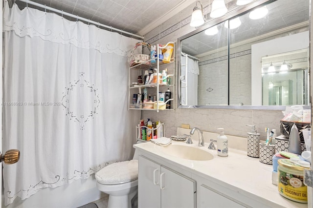 full bathroom featuring shower / bath combo, decorative backsplash, ornamental molding, vanity, and toilet