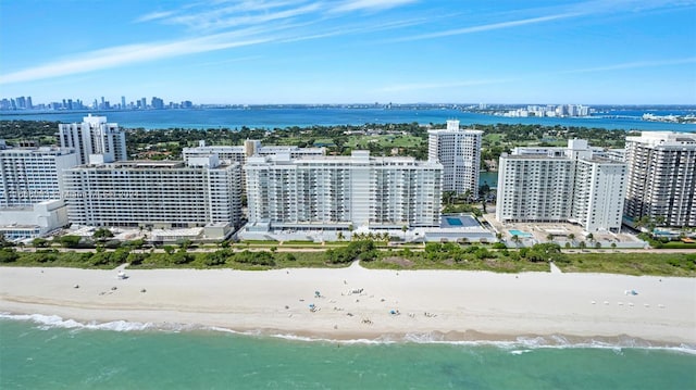 drone / aerial view with a view of the beach and a water view