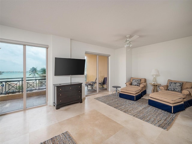 living room featuring ceiling fan