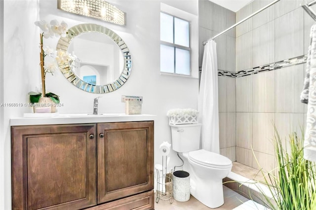 bathroom featuring vanity, toilet, and walk in shower