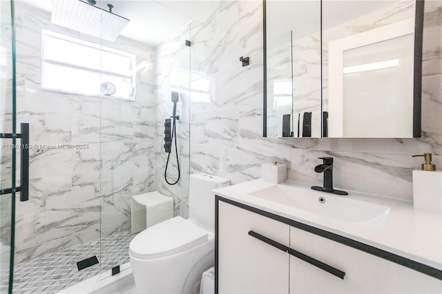 bathroom featuring vanity, tasteful backsplash, tile walls, toilet, and a shower with door