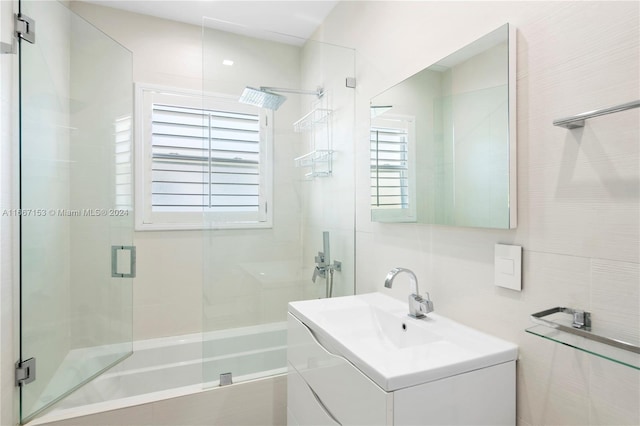 bathroom featuring vanity and a wealth of natural light