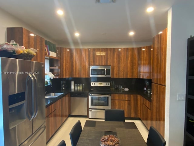 kitchen featuring sink and appliances with stainless steel finishes