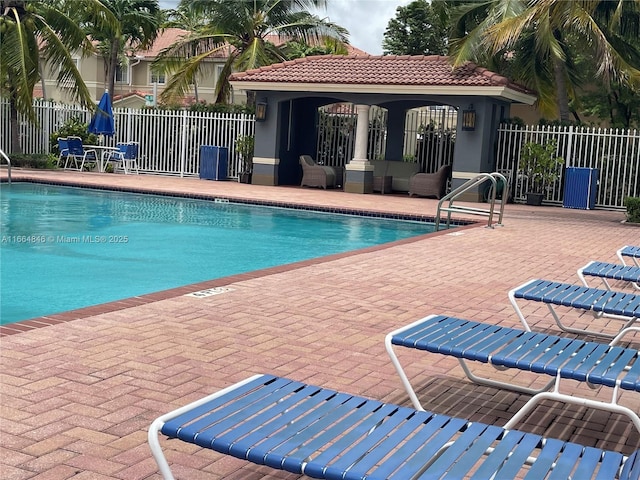 view of swimming pool featuring a patio