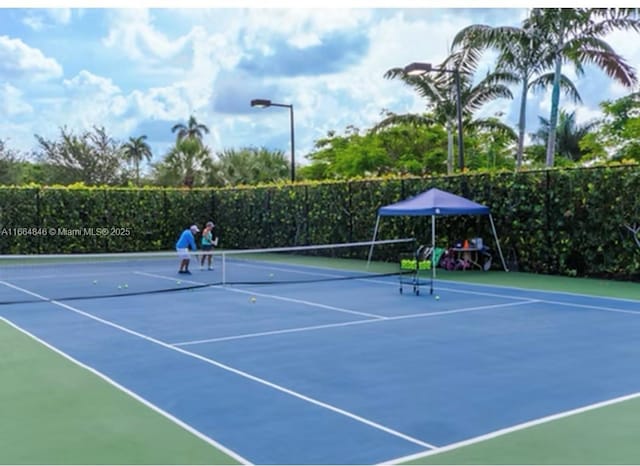 view of sport court featuring basketball court