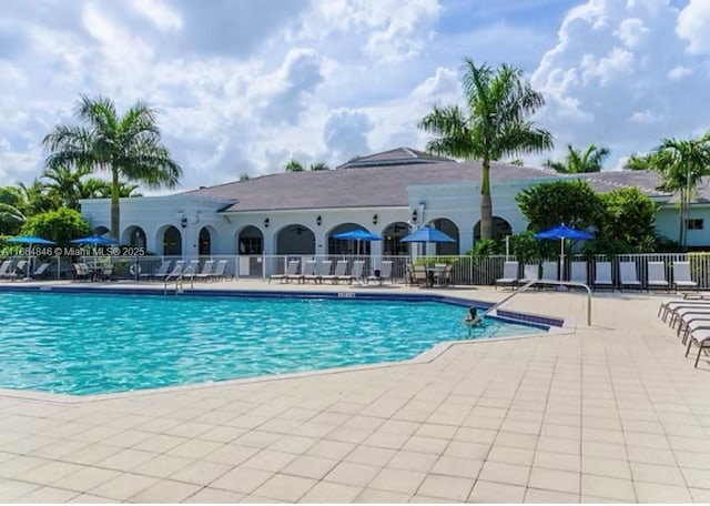 view of pool featuring a patio