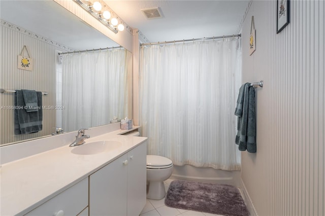 full bathroom featuring vanity, tile patterned flooring, toilet, and shower / bathtub combination with curtain