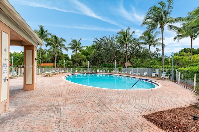 view of swimming pool featuring a patio area