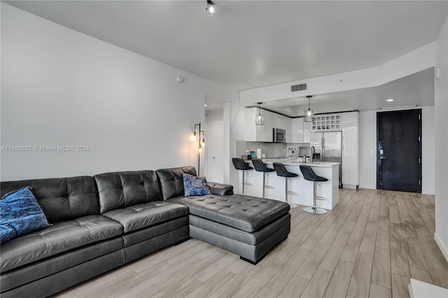 living room featuring light hardwood / wood-style floors