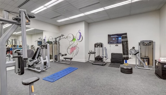 exercise room with carpet floors