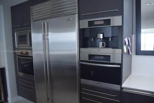 kitchen featuring built in appliances