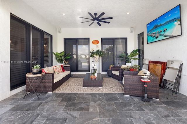 view of patio featuring ceiling fan and an outdoor hangout area