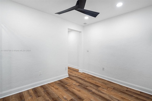 spare room featuring dark hardwood / wood-style floors