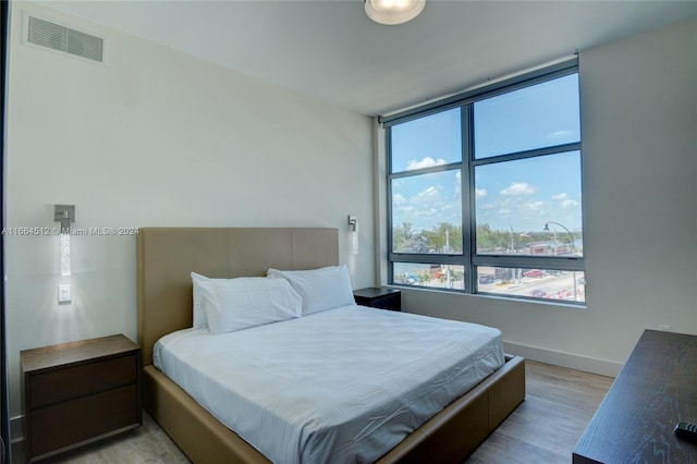 bedroom featuring light hardwood / wood-style floors