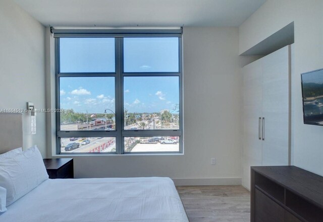 bedroom featuring light hardwood / wood-style flooring