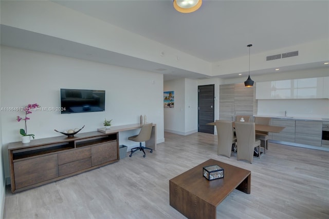 living room featuring light hardwood / wood-style floors