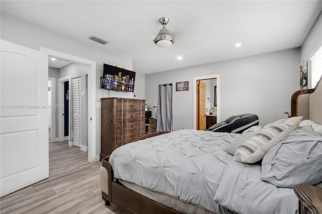 bedroom featuring light hardwood / wood-style floors