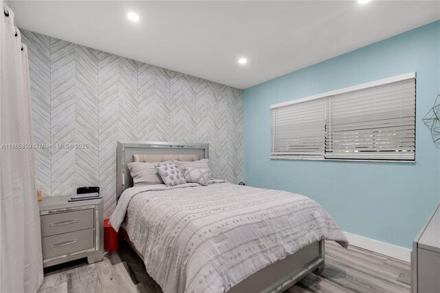 bedroom featuring light hardwood / wood-style flooring