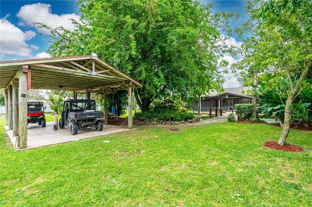 view of yard with a carport