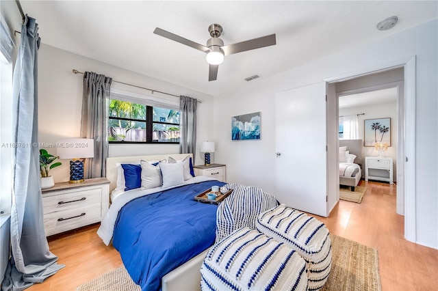 bedroom featuring ceiling fan and light wood-type flooring