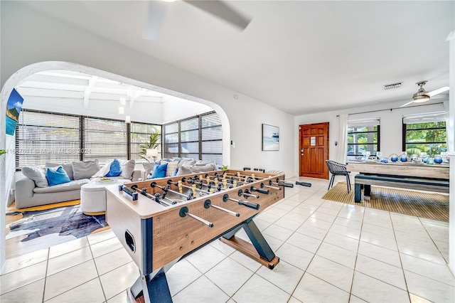 game room featuring light tile patterned floors and ceiling fan