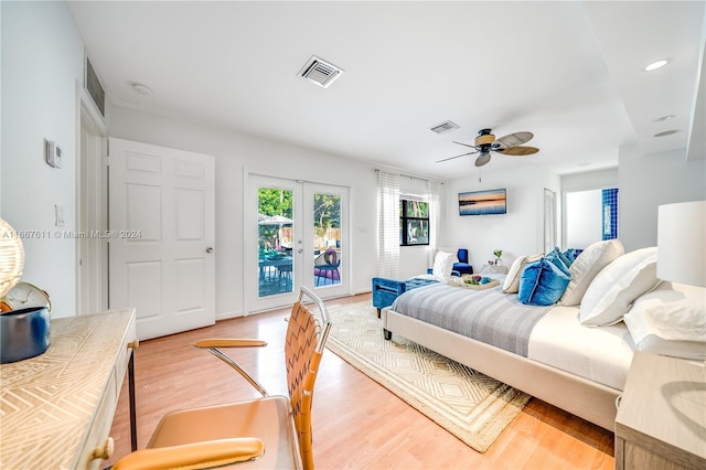 bedroom with ceiling fan, light hardwood / wood-style floors, access to exterior, and french doors