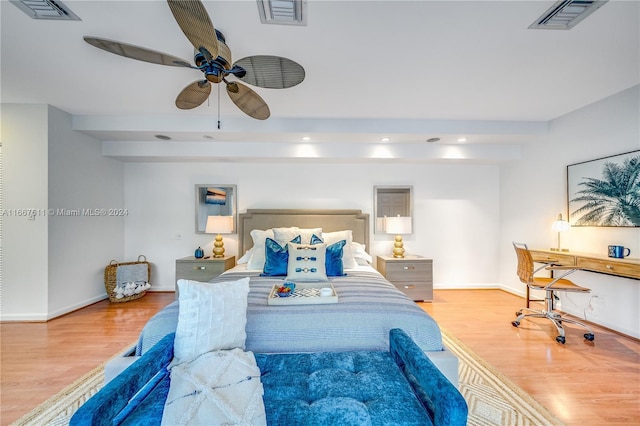 bedroom with ceiling fan and wood-type flooring