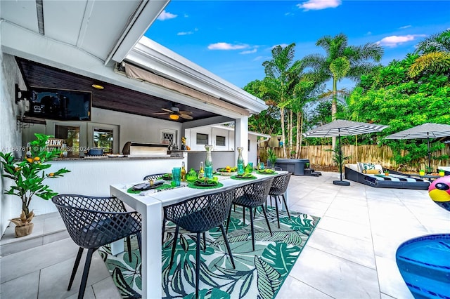 view of patio featuring exterior bar