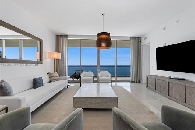 living room with floor to ceiling windows