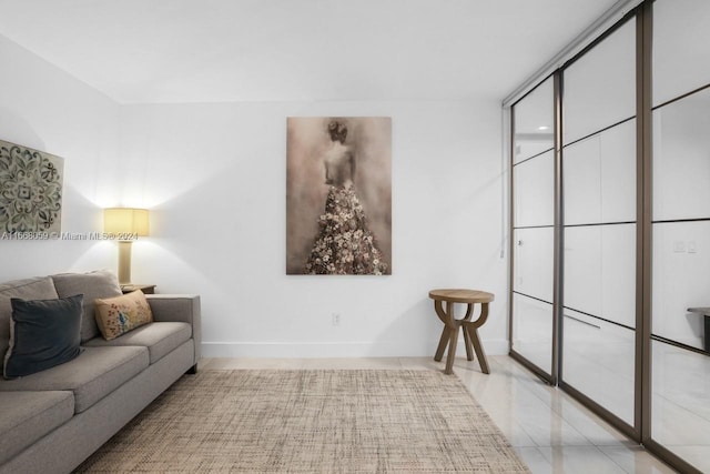 living room with light tile patterned floors